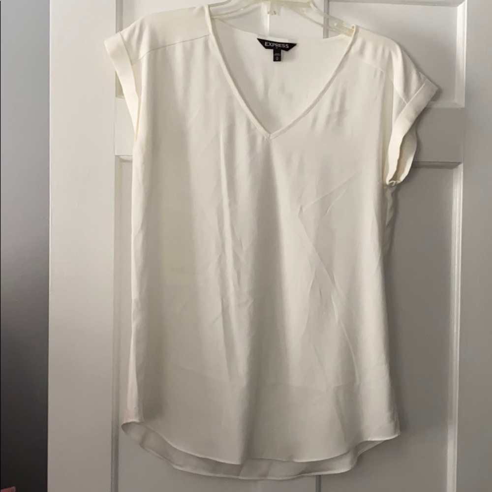 Ivory flowy blouse from express -size Medium